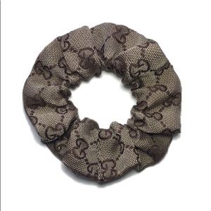 Scrunchie made from recycled Gucci fabric.